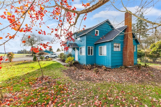 30274 Peoria Rd, Shedd, OR 97377 - rear view of property with a chimney, roof with shingles, and board and batten siding