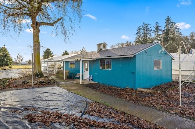30274 Peoria Rd, Shedd, OR 97377 - back of property featuring a shingled roof