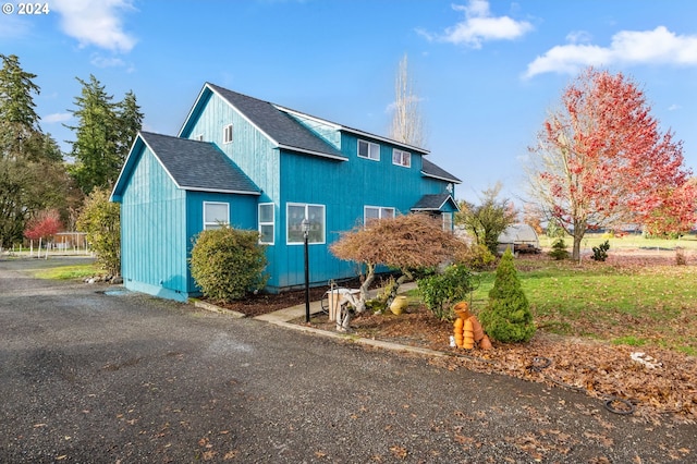 30274 Peoria Rd, Shedd, OR 97377 - view of property exterior with roof with shingles
