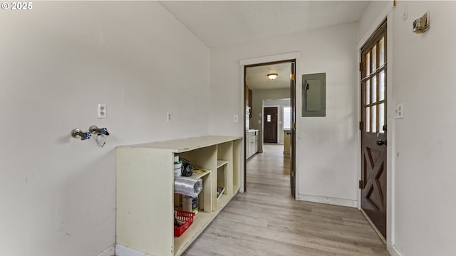 976 E St, Coos Bay, OR 97420 - hall featuring electric panel, light wood-type flooring, and baseboards