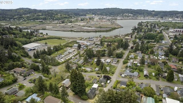 976 E St, Coos Bay, OR 97420 - aerial overview of property's location with a large body of water and nearby suburban area