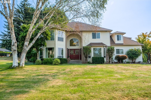 view of front of home featuring a front yard