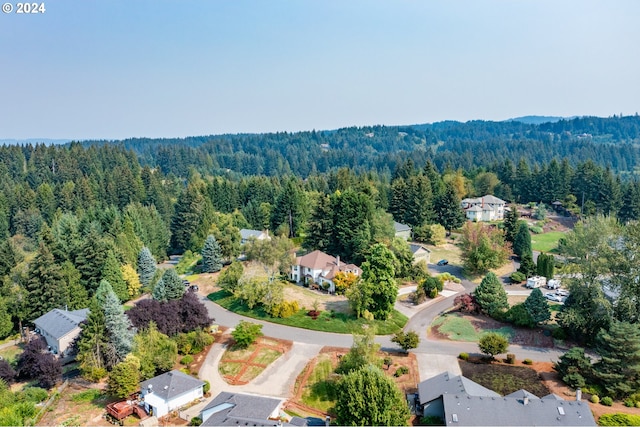 bird's eye view featuring a residential view and a view of trees