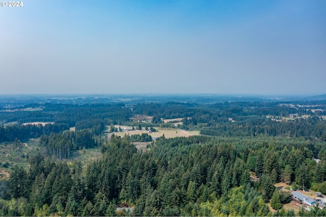 aerial view featuring a view of trees