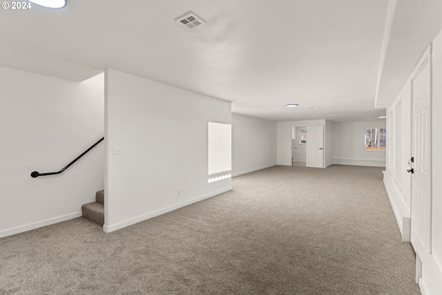 basement with light colored carpet