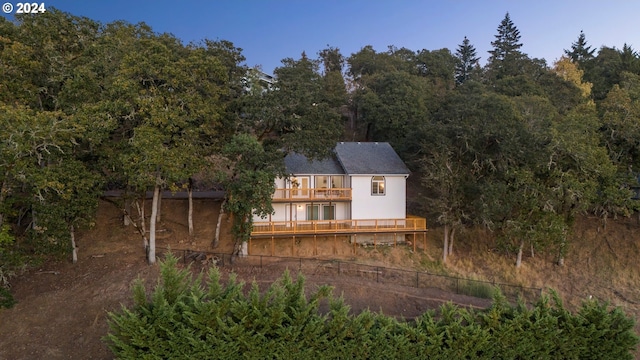 rear view of house with a balcony