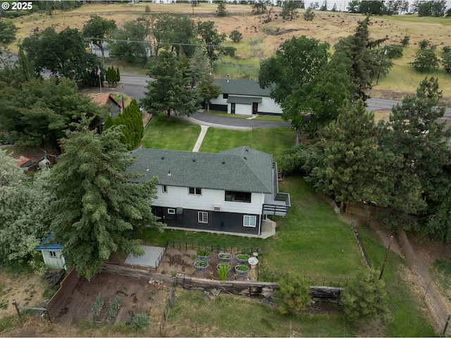 birds eye view of property featuring a rural view