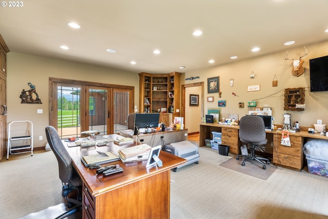 office space with light carpet and french doors