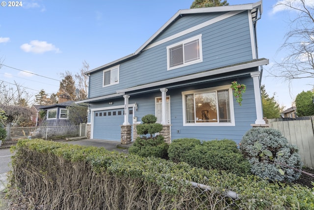 front facade with a garage