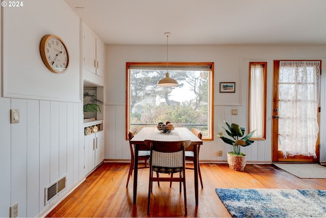 dining space featuring light hardwood / wood-style floors