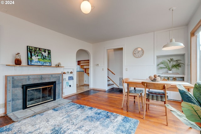 living room featuring hardwood / wood-style flooring and a fireplace