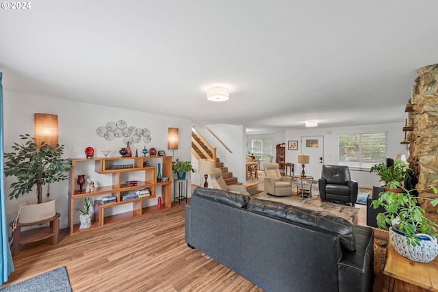 living room with light hardwood / wood-style flooring