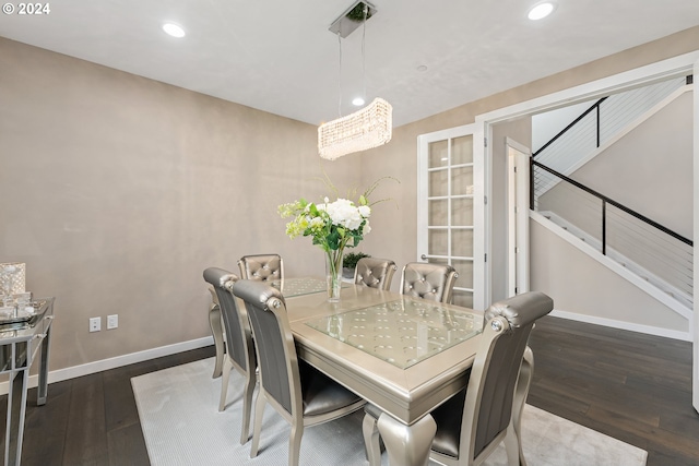 dining area with dark wood-style floors, stairs, baseboards, and recessed lighting