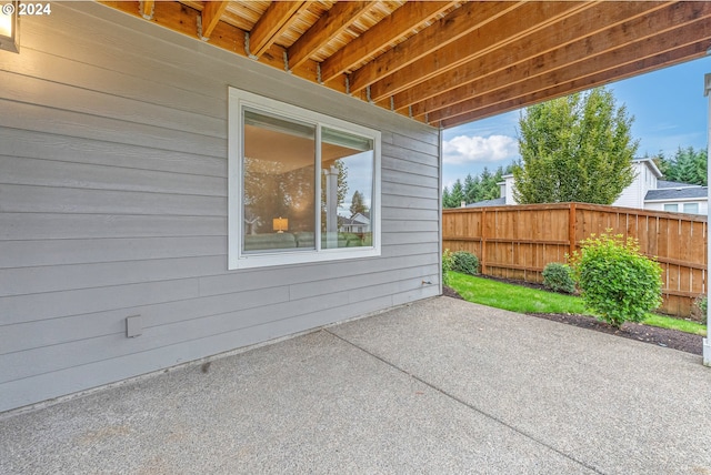 view of patio / terrace with fence