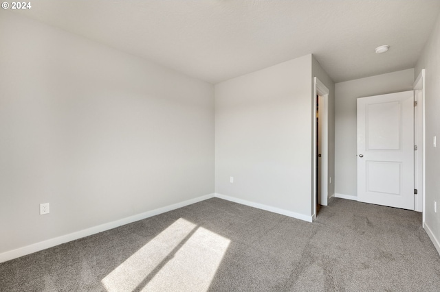 unfurnished bedroom with carpet