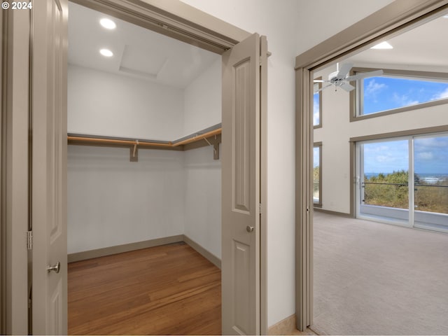 32227 Seascape Ln, Cannon Beach, OR 97110 - walk in closet featuring ceiling fan, light wood finished floors, and vaulted ceiling