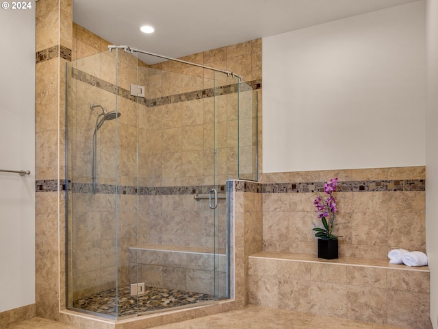 bathroom with an enclosed shower