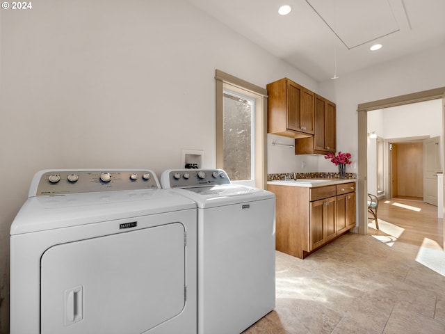 32227 Seascape Ln, Cannon Beach, OR 97110 - laundry room featuring washing machine and dryer, attic access, recessed lighting, and a sink