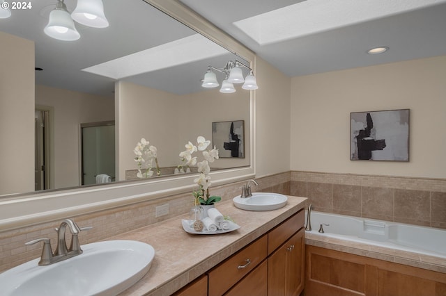 bathroom with an inviting chandelier, vanity, and plus walk in shower