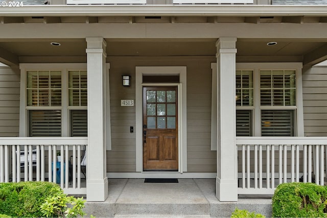 doorway to property featuring a porch