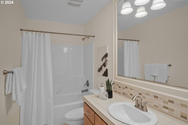 full bathroom featuring backsplash, shower / bathtub combination with curtain, vanity, and toilet