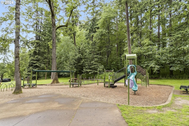 view of play area featuring a lawn