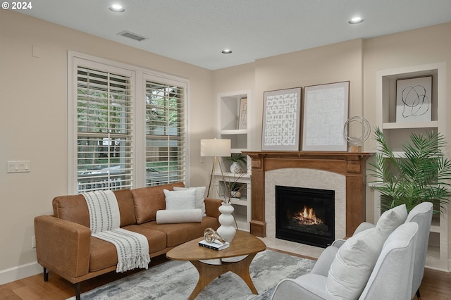 living room with light hardwood / wood-style flooring