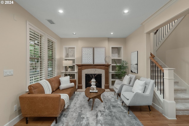 living area featuring hardwood / wood-style floors