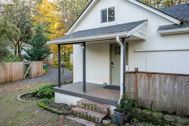 property entrance featuring a patio