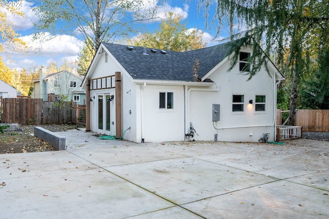 rear view of property with a patio