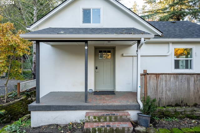 property entrance featuring a porch