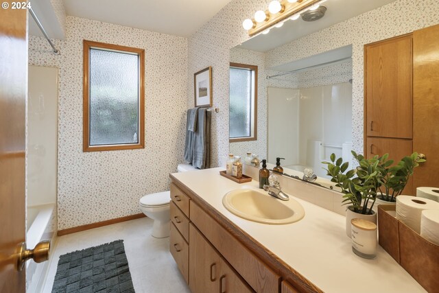 16354 SW 130th Ter Unit 76, King City, OR 97224 - full bathroom with toilet, wallpapered walls, and vanity