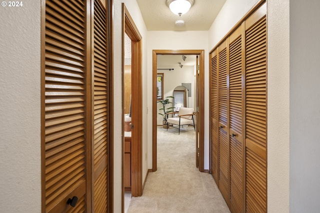 16354 SW 130th Ter Unit 76, King City, OR 97224 - hall featuring light carpet