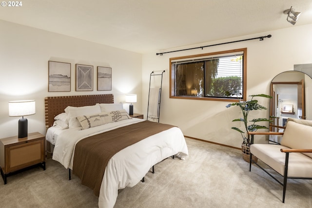 16354 SW 130th Ter Unit 76, King City, OR 97224 - carpeted bedroom featuring baseboards