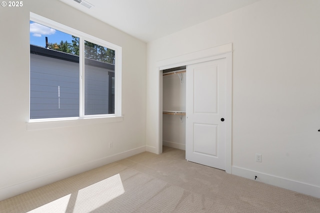 15708 NW Raywood Ln Unit L 24, Portland, OR 97229 - unfurnished bedroom with carpet flooring, a closet, and baseboards
