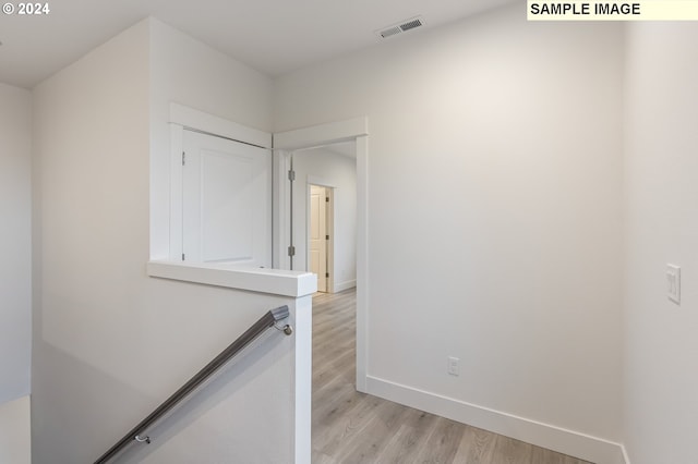 hall featuring light wood-type flooring