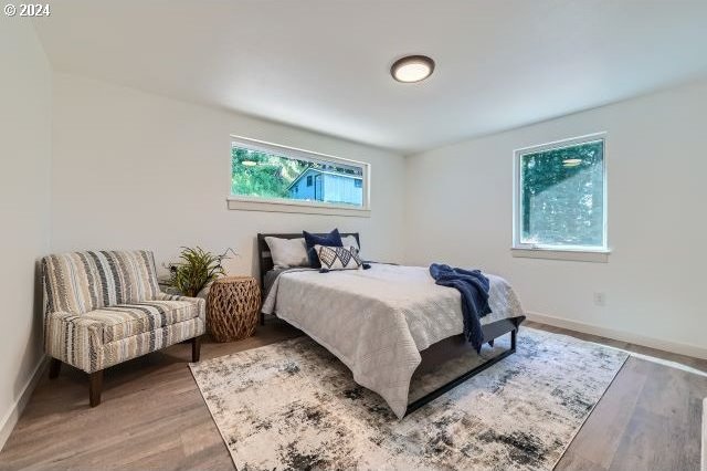 bedroom featuring hardwood / wood-style floors