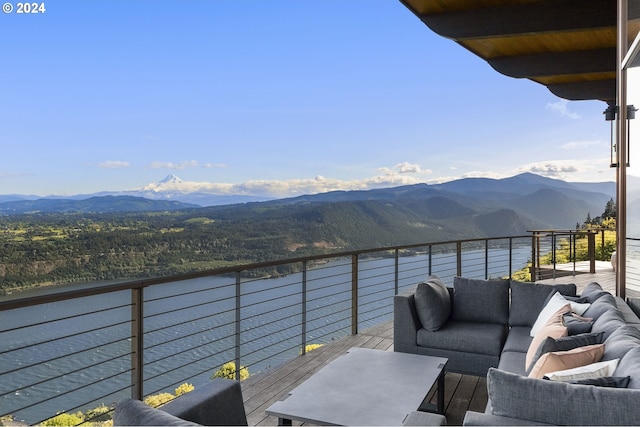 balcony featuring outdoor lounge area and a mountain view