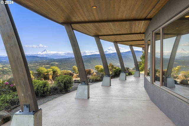 view of patio / terrace featuring a mountain view