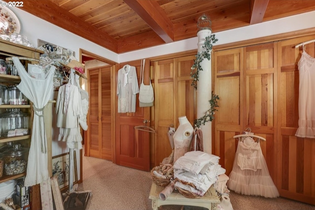 misc room with light colored carpet, beam ceiling, and wooden ceiling