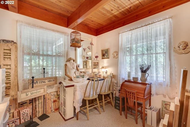 interior space with wood ceiling, beam ceiling, and carpet flooring