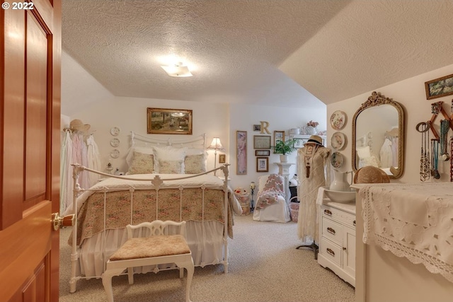 carpeted bedroom with a textured ceiling