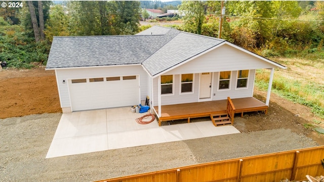 view of front of house featuring an outdoor structure and a garage