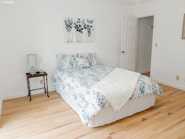 bedroom featuring hardwood / wood-style flooring