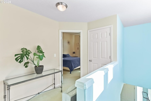 corridor featuring carpet