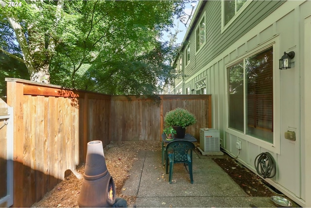 view of patio / terrace with a fenced backyard and cooling unit