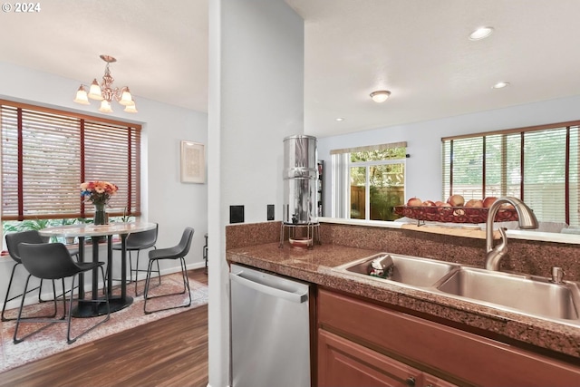 kitchen featuring dishwasher, a chandelier, sink, and dark hardwood / wood-style flooring