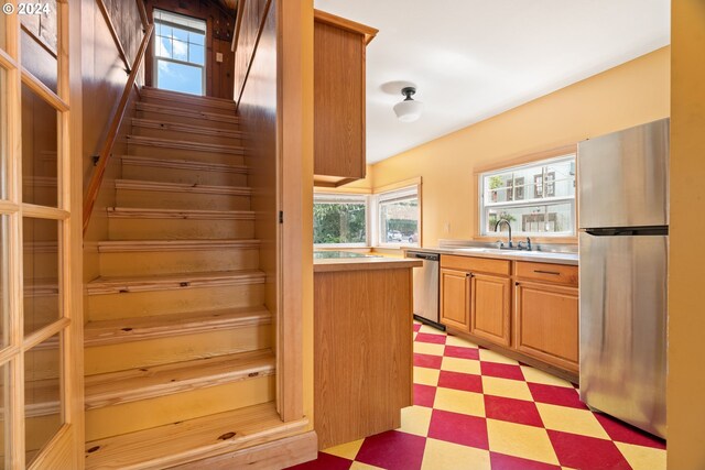 staircase featuring sink