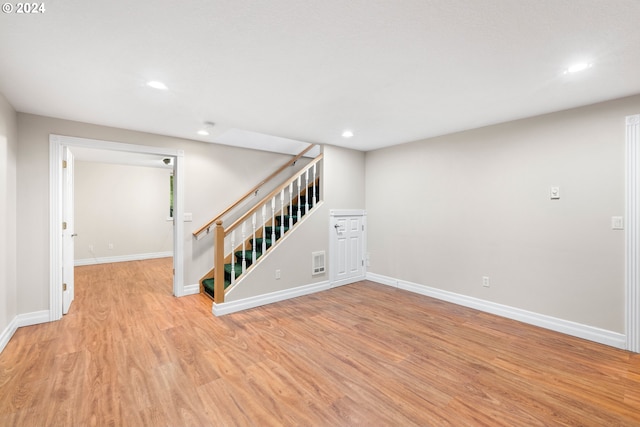 basement featuring light hardwood / wood-style floors