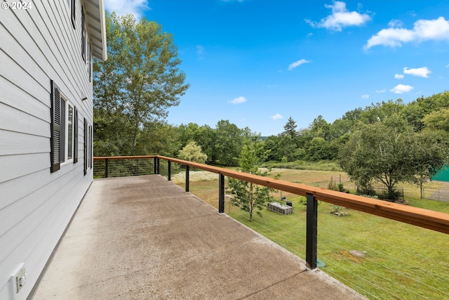 wooden deck featuring a yard